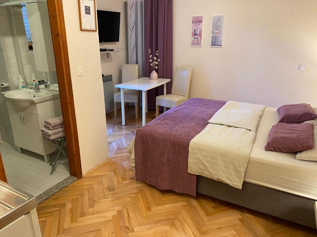 Postel nebo postele na pokoji v ubytování Dora