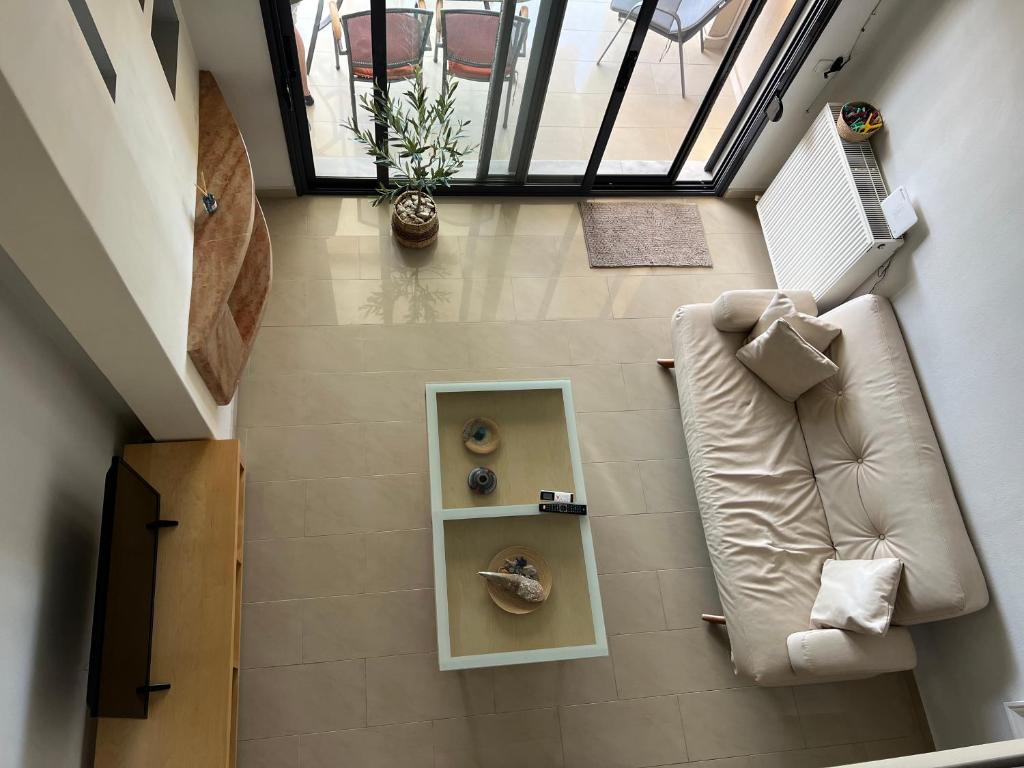 Posezení v ubytování Two-storey Beachfront Maisonette