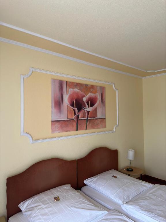 Postel nebo postele na pokoji v ubytování Dillinger Hof
