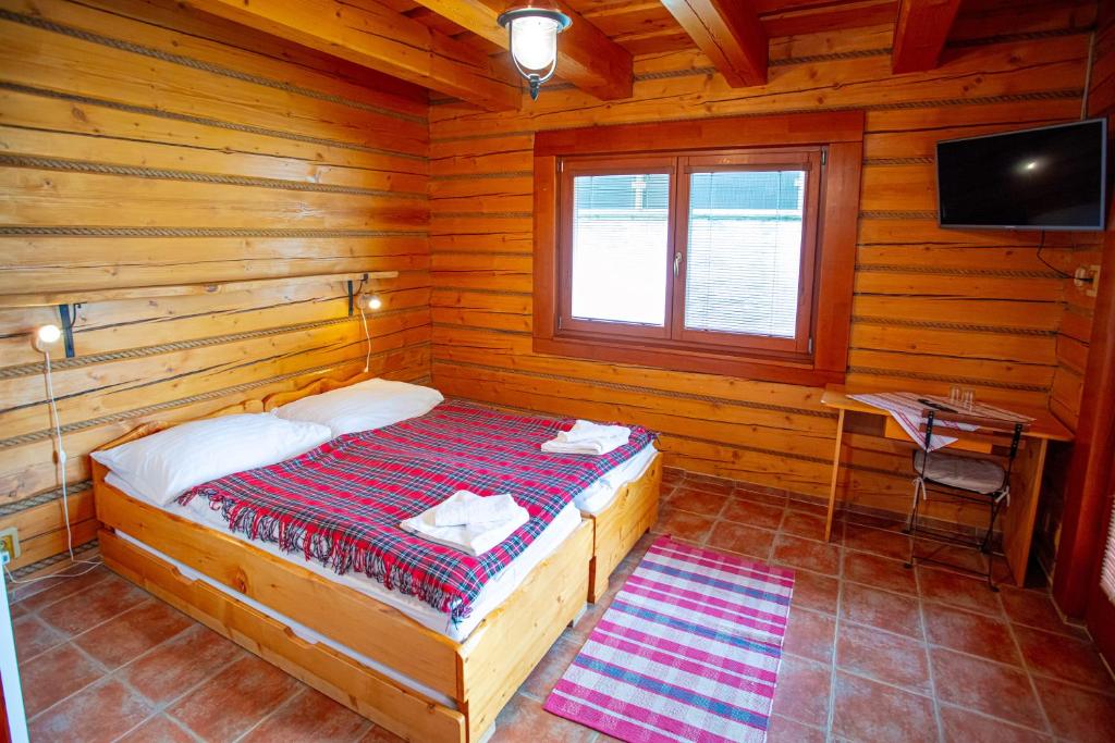 Letto o letti in una camera di Penzion Oravsky Zrub