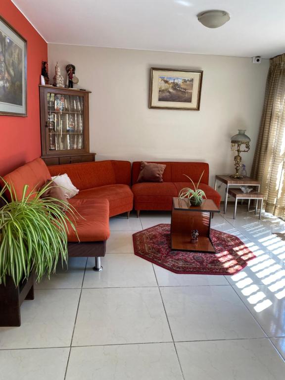 Uma área de estar em Villa San José