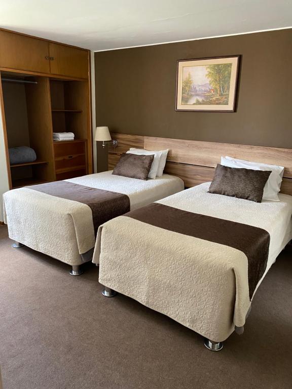Cama ou camas em um quarto em Villa San José