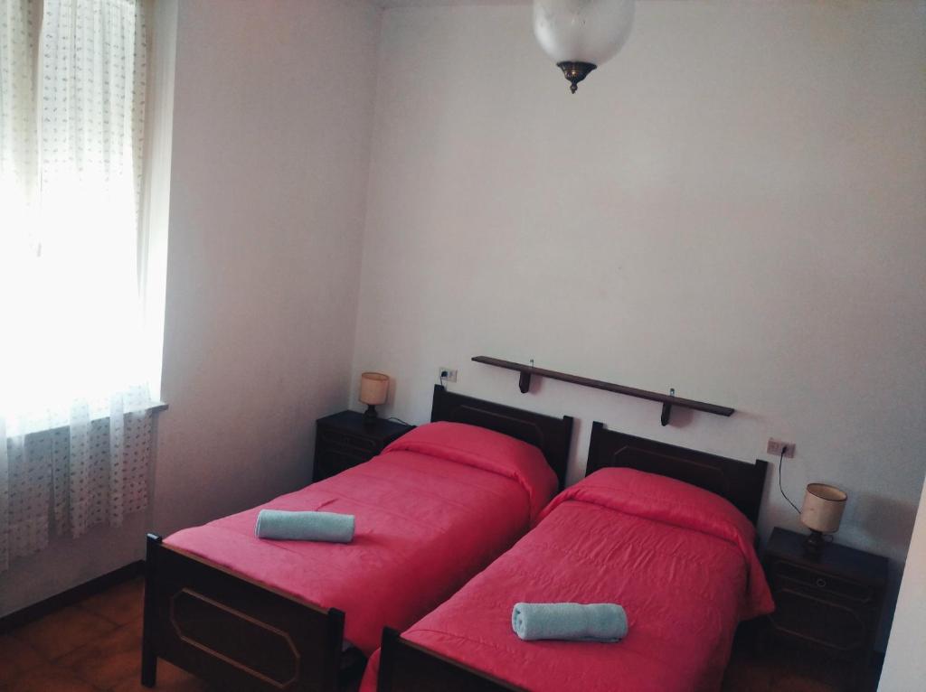 Postel nebo postele na pokoji v ubytování Albergo Belvedere