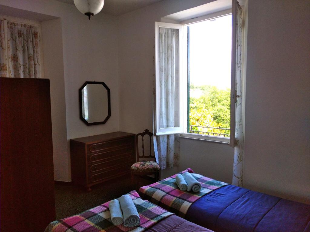 Postel nebo postele na pokoji v ubytování Albergo Belvedere