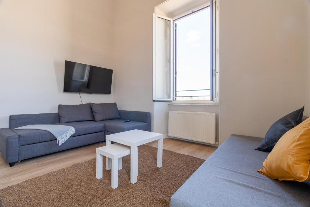 Posezení v ubytování Joe Litty Rooms