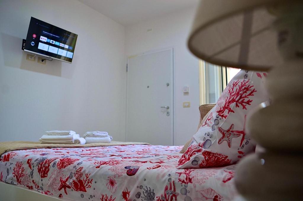 Postel nebo postele na pokoji v ubytování Elegant Dei Rooms
