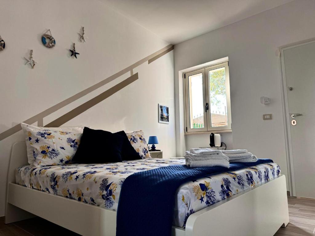 Postel nebo postele na pokoji v ubytování Elegant Dei Rooms