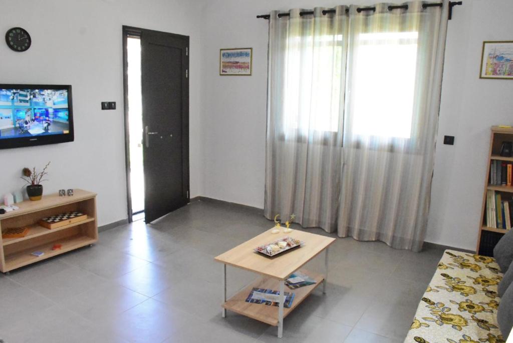 TV a/nebo společenská místnost v ubytování Casa Luminosa Guesthouse