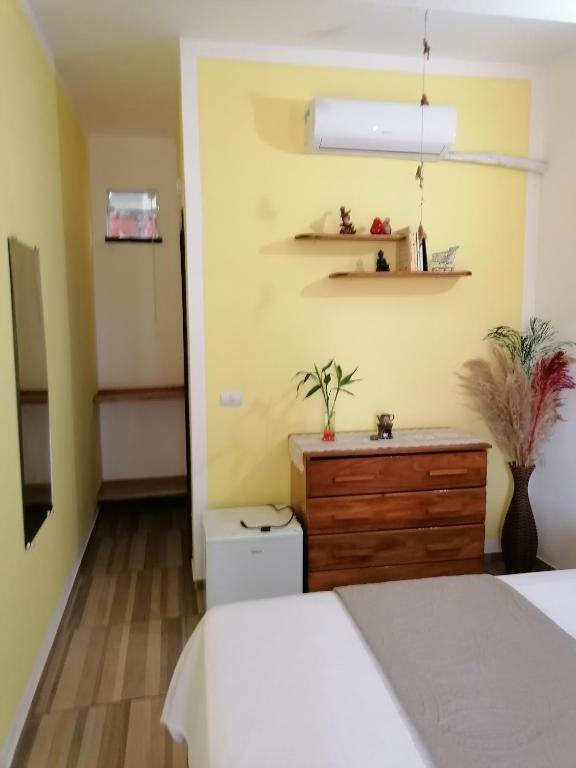 Postel nebo postele na pokoji v ubytování o erético