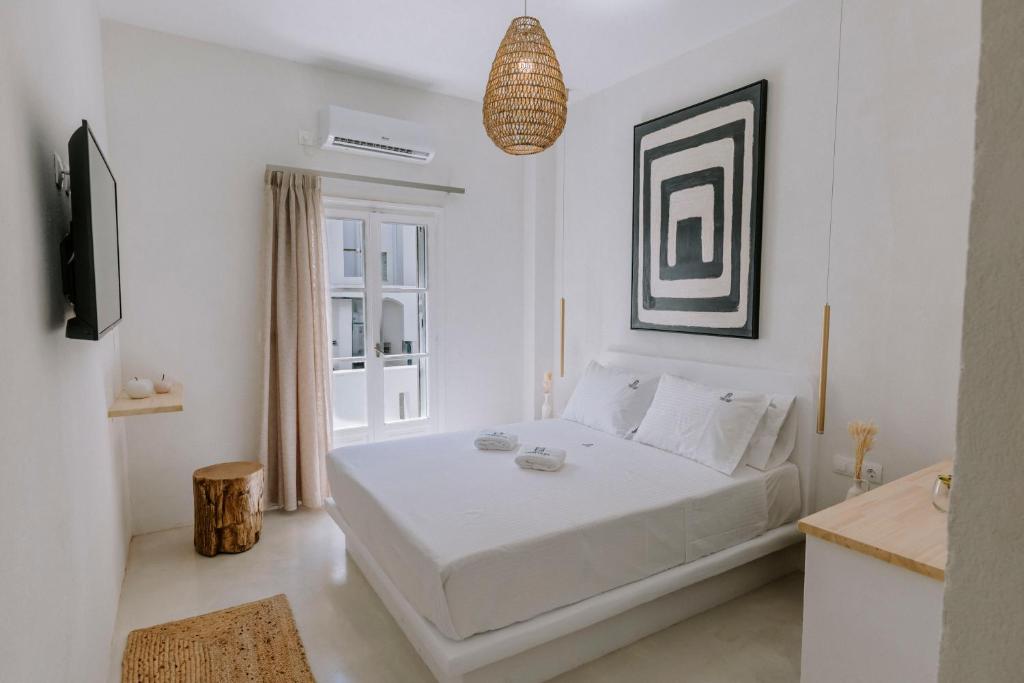 Ένα ή περισσότερα κρεβάτια σε δωμάτιο στο HERCULES LUXURY LIVING