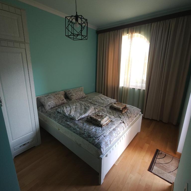 Postel nebo postele na pokoji v ubytování Alpha Rest House