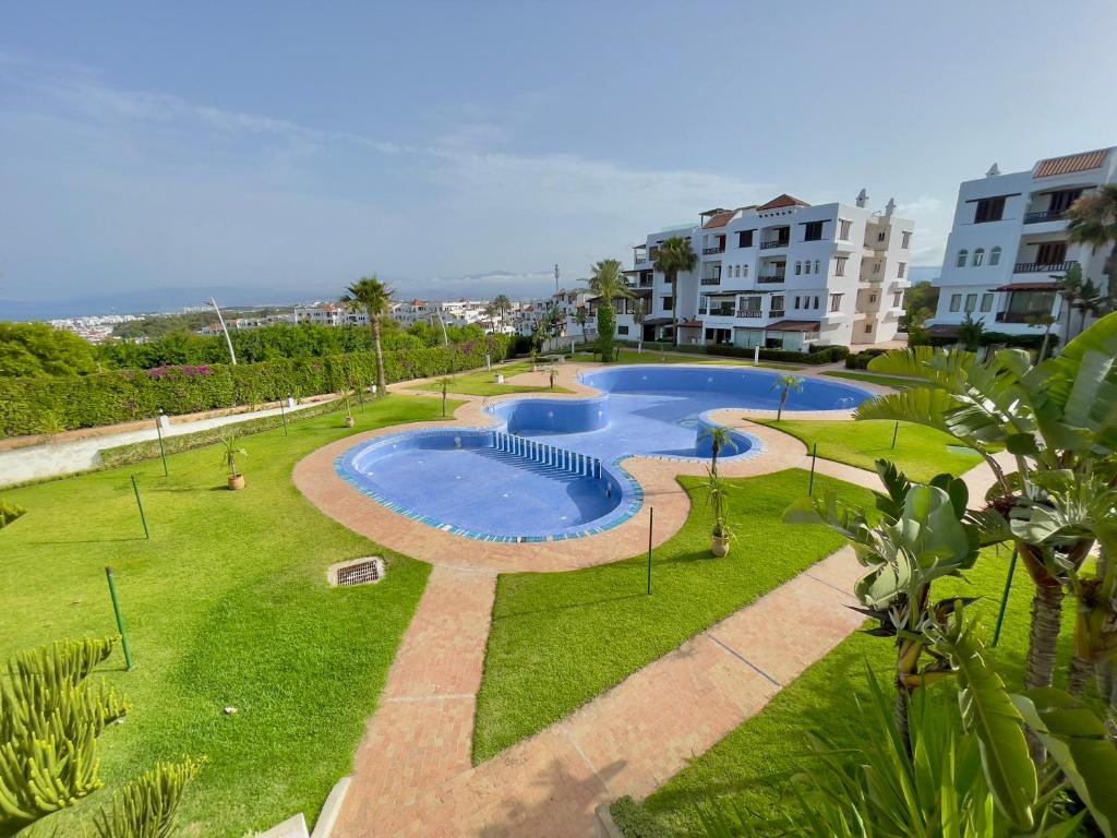 Bazén v ubytování CaboNegro Beach Residence nebo v jeho okolí