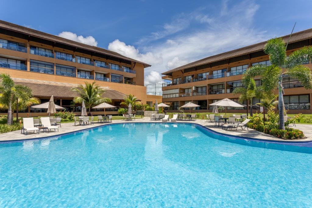 Bazén v ubytování Flats Eco Resort Praia dos Carneiros nebo v jeho okolí