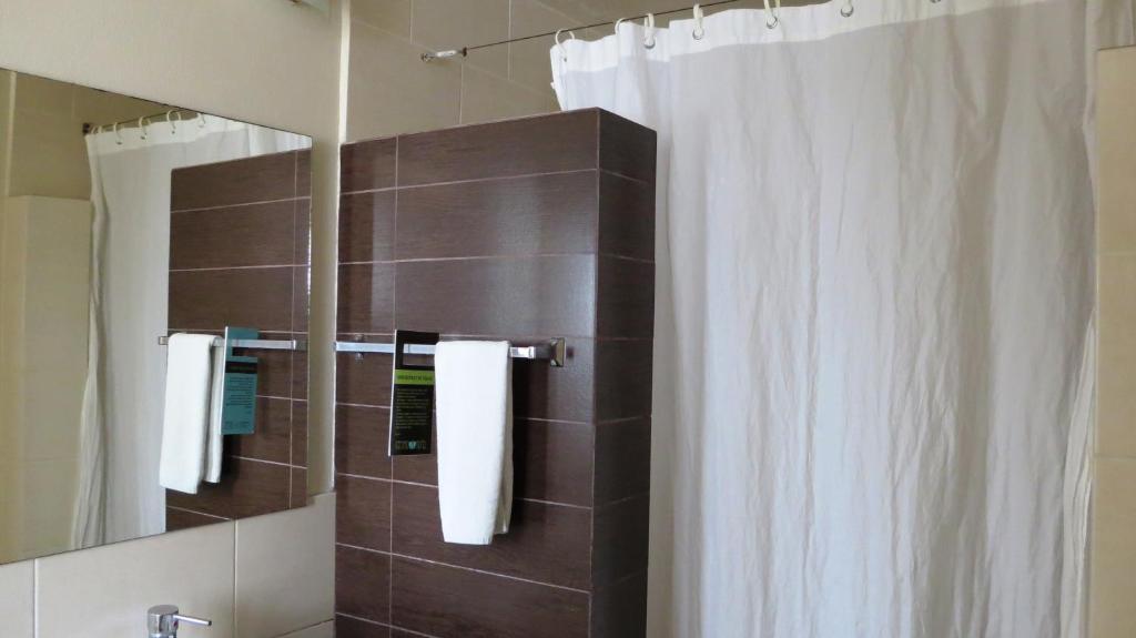 Koupelna v ubytování Centro 19 Hotel