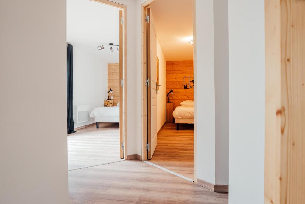Posteľ alebo postele v izbe v ubytovaní La maison du Xetté