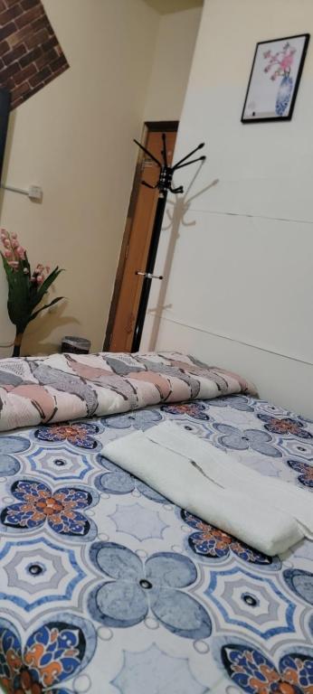 Postel nebo postele na pokoji v ubytování MAMA DELiGHT HOME