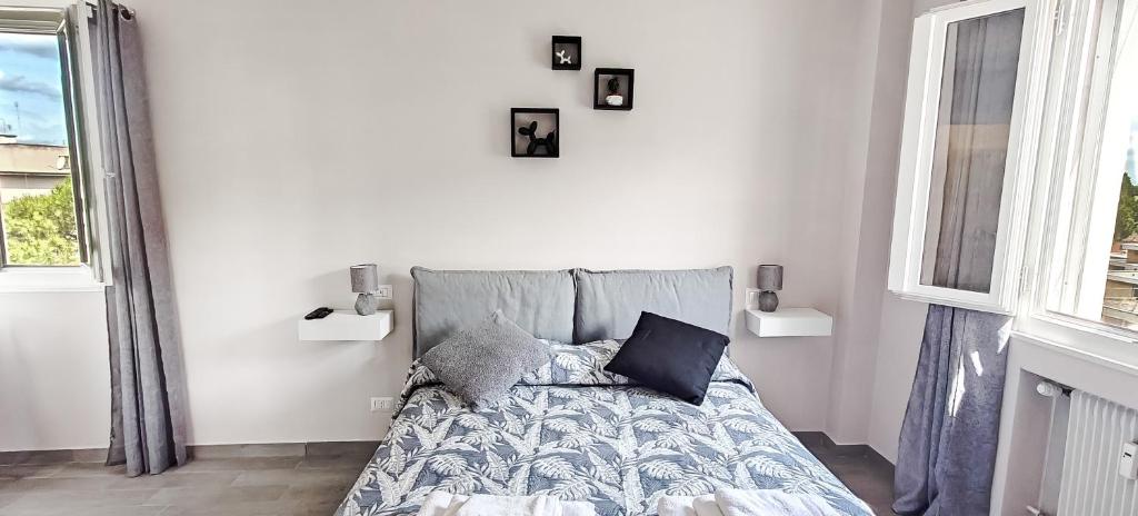 Postel nebo postele na pokoji v ubytování Rome Essence Apartament