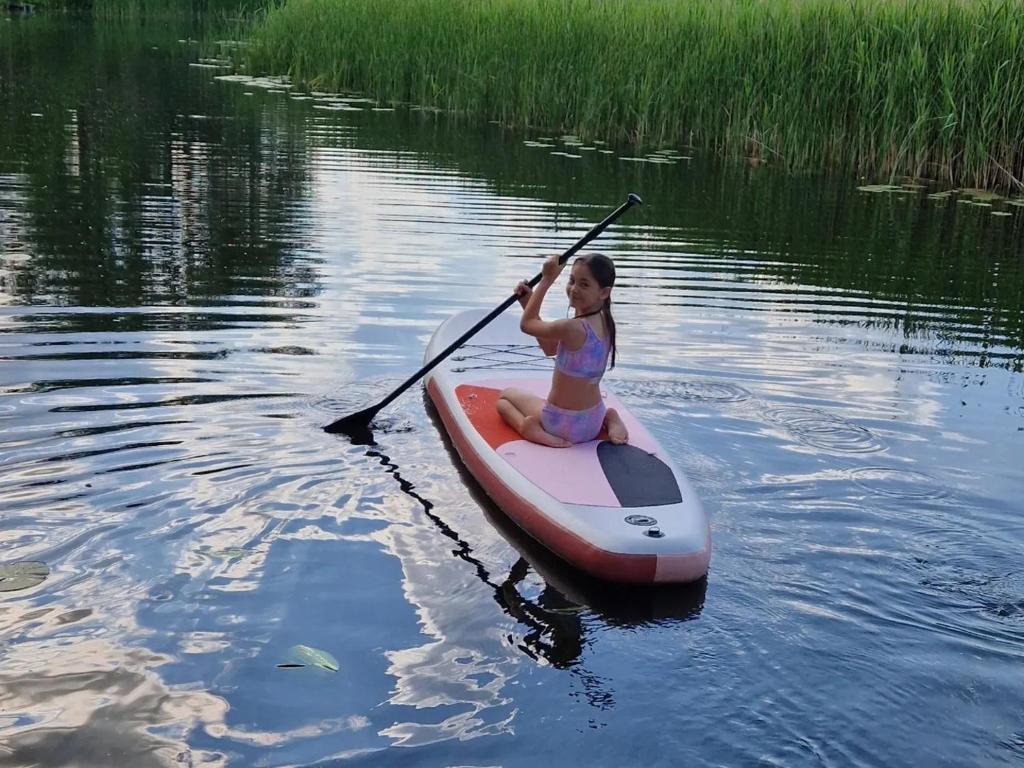 Hostia v ubytovaní Dom nad rzeką Legą