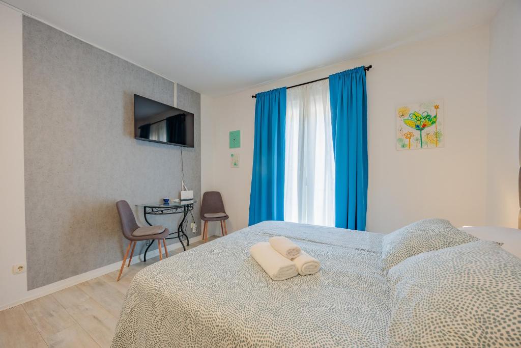 Posteľ alebo postele v izbe v ubytovaní Guest House Arsenal Accommodation