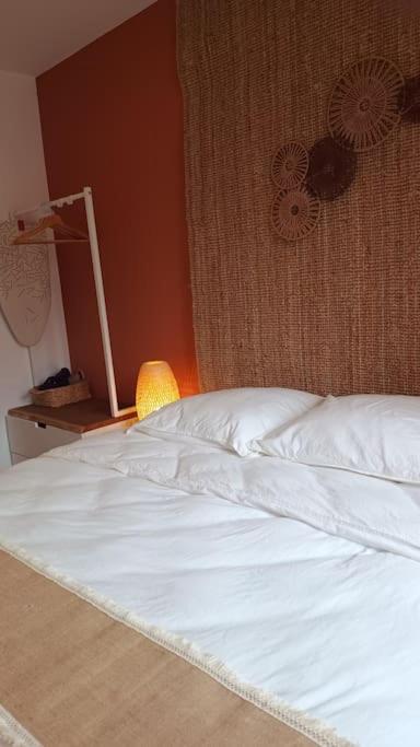 Postel nebo postele na pokoji v ubytování Le Physalis gîte tout confort