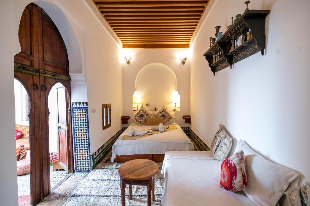 Letto o letti in una camera di Dar Authentic Fes - familly hosting