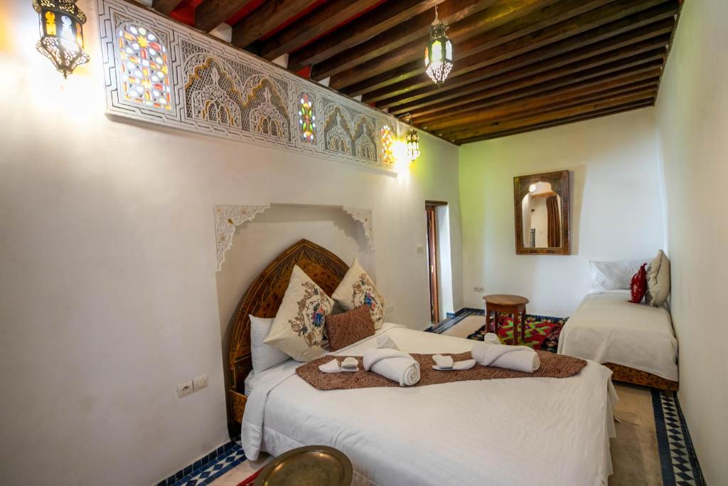 Letto o letti in una camera di Dar Authentic Fes - familly hosting