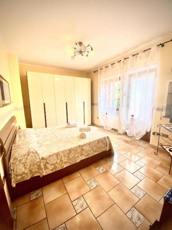 Postel nebo postele na pokoji v ubytování Alex Room