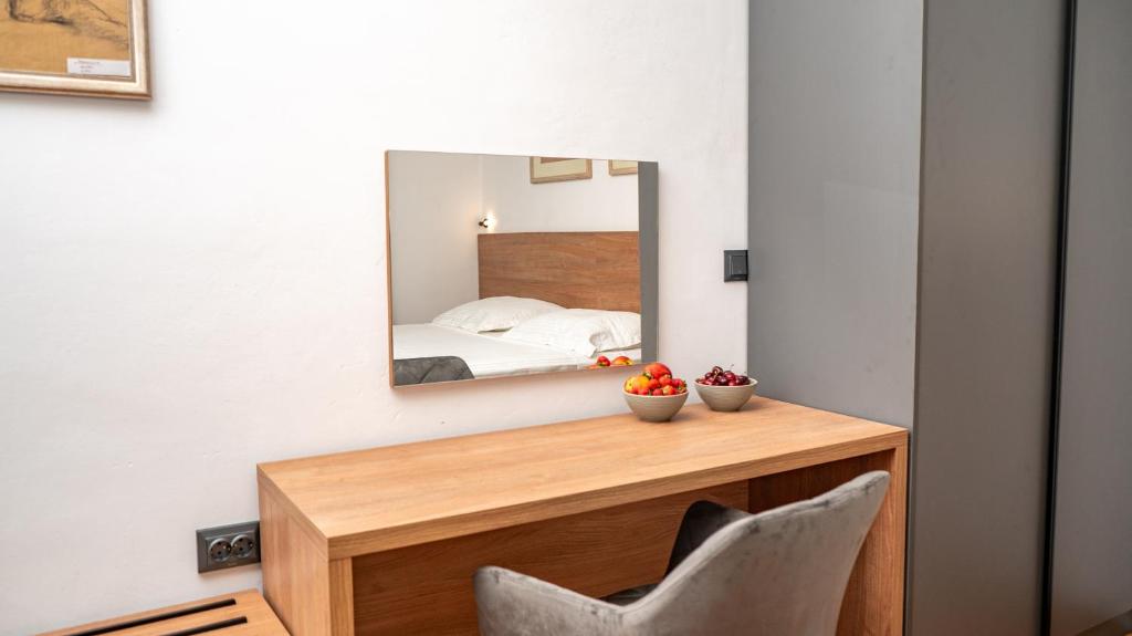 Posteľ alebo postele v izbe v ubytovaní Apartments Kudelik