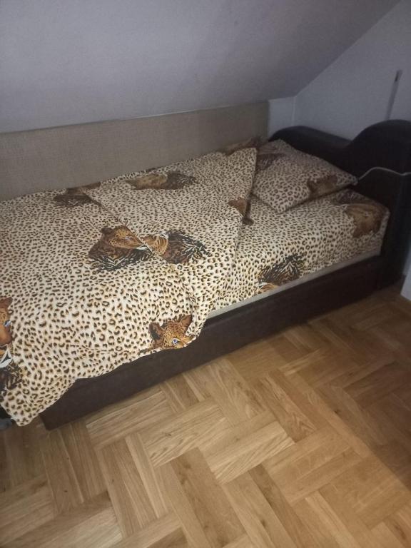 Postel nebo postele na pokoji v ubytování Apartmani Partaljeviċ