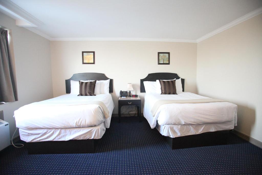 
Executive Room with Two Double Beds
