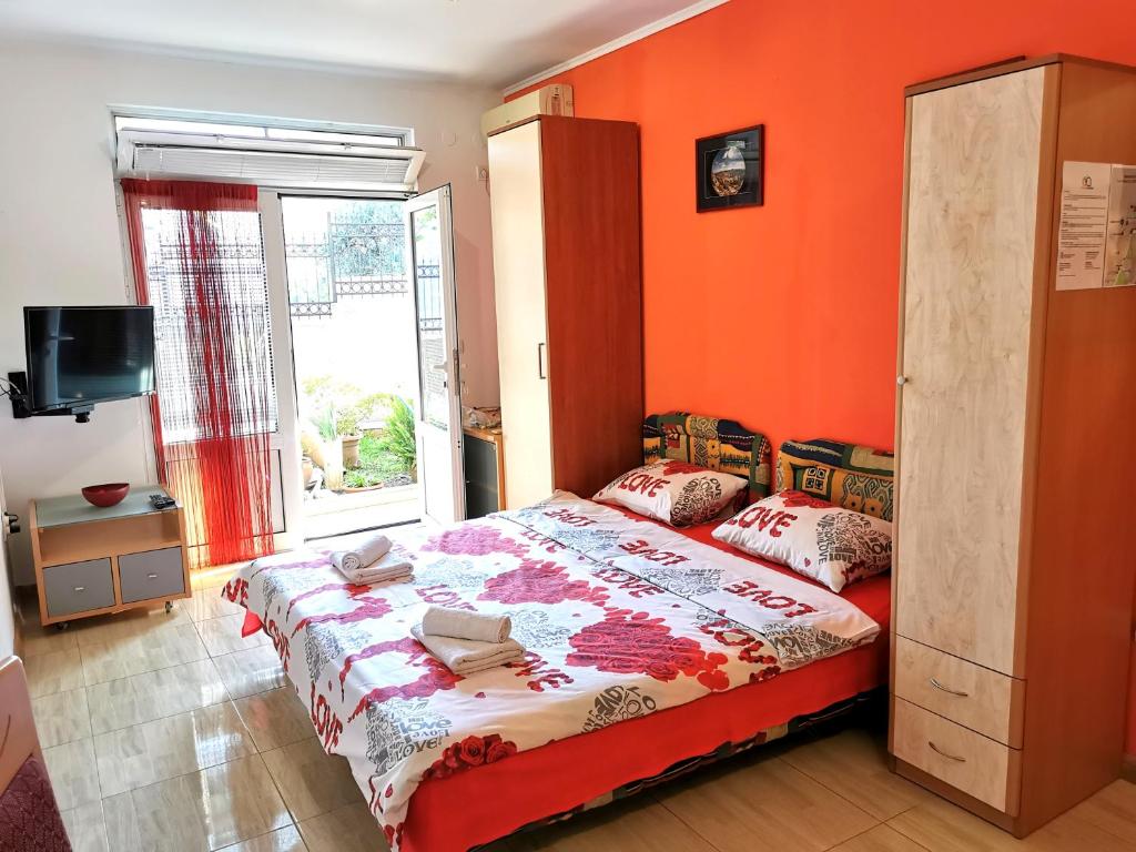 Postel nebo postele na pokoji v ubytování Durakovic Apartments