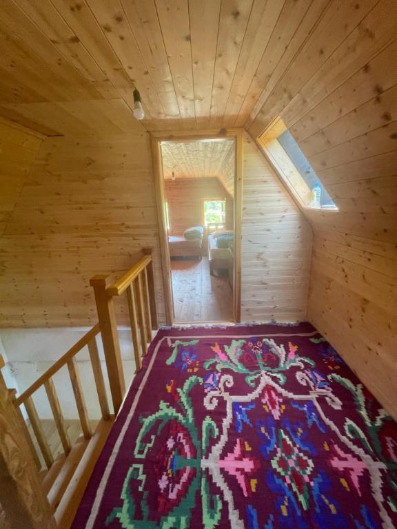 Postel nebo postele na pokoji v ubytování Rupa Guest House