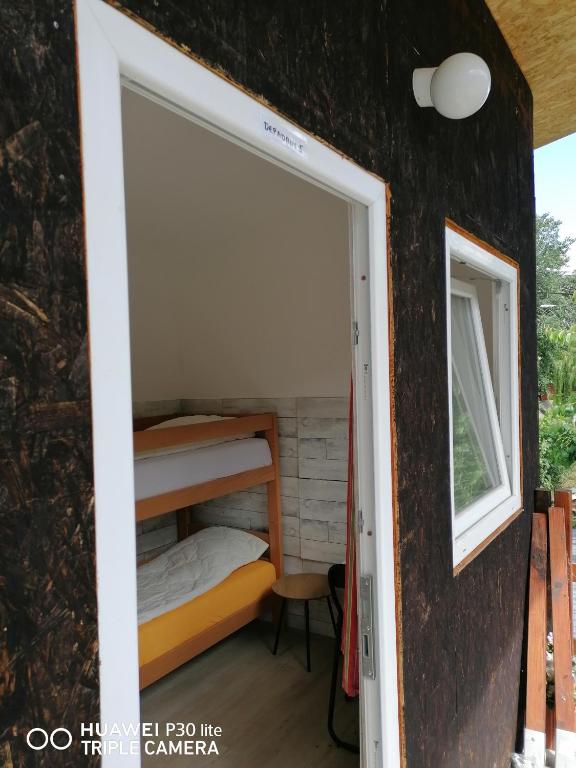 Ένα ή περισσότερα κρεβάτια σε δωμάτιο στο Hostel Trajan
