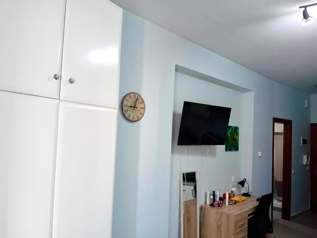 TV a/nebo společenská místnost v ubytování Scenario Studios