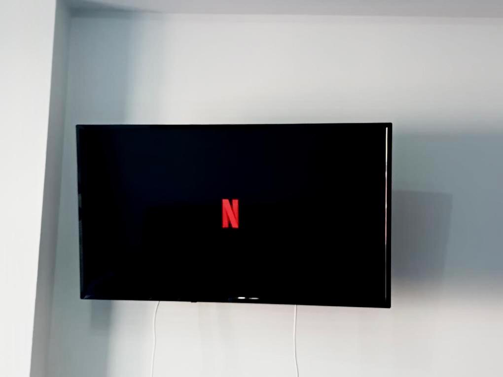 TV a/nebo společenská místnost v ubytování Scenario Studios