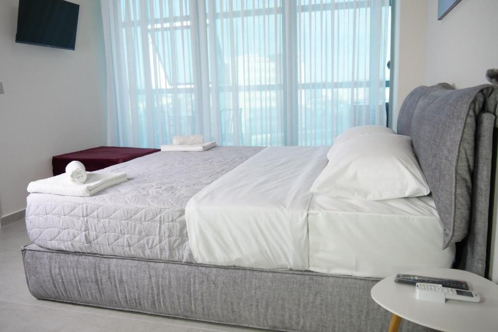 Postel nebo postele na pokoji v ubytování STAY-FIVE rooms & apartments