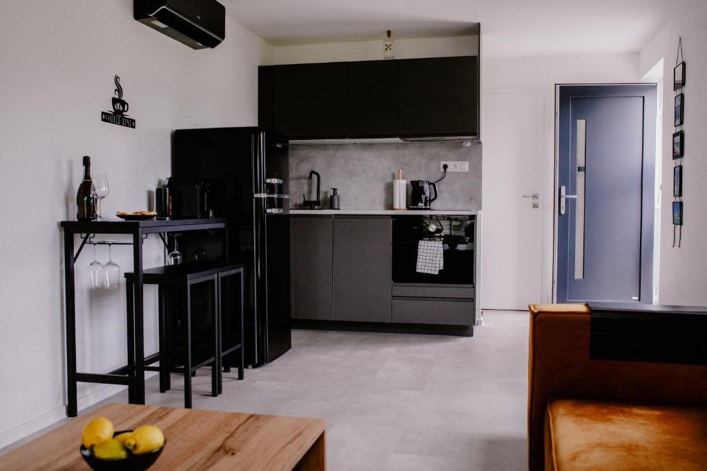 Kuchyň nebo kuchyňský kout v ubytování Apartment Fratello