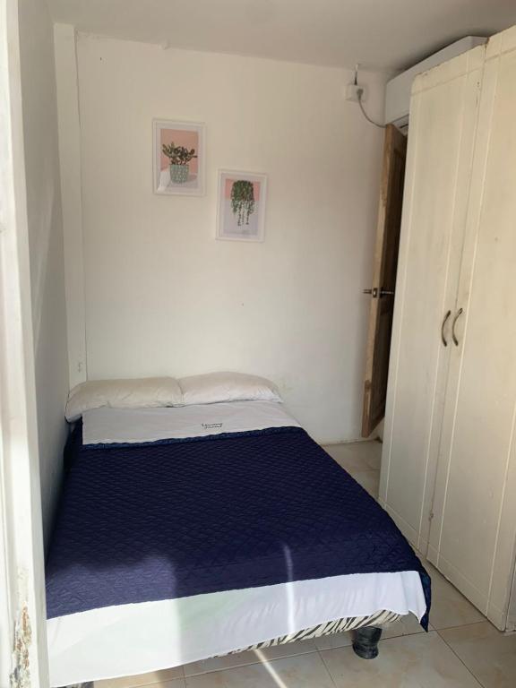 Postel nebo postele na pokoji v ubytování Veranera Hostal