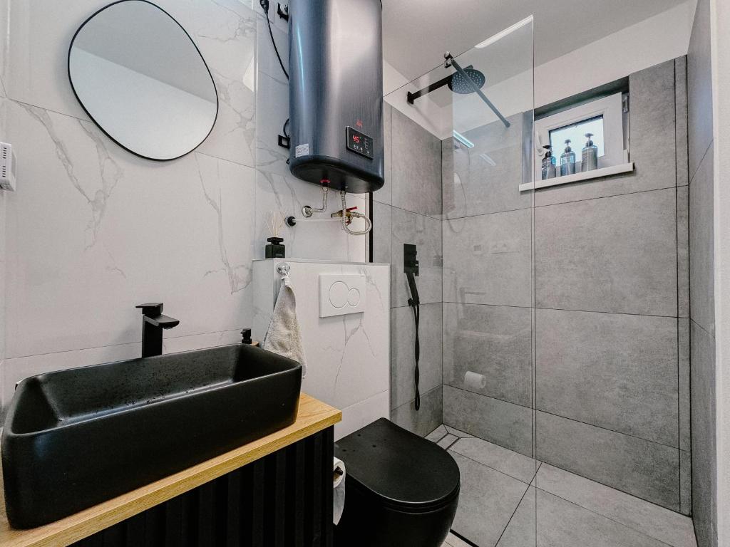 Koupelna v ubytování Apartment Fratello