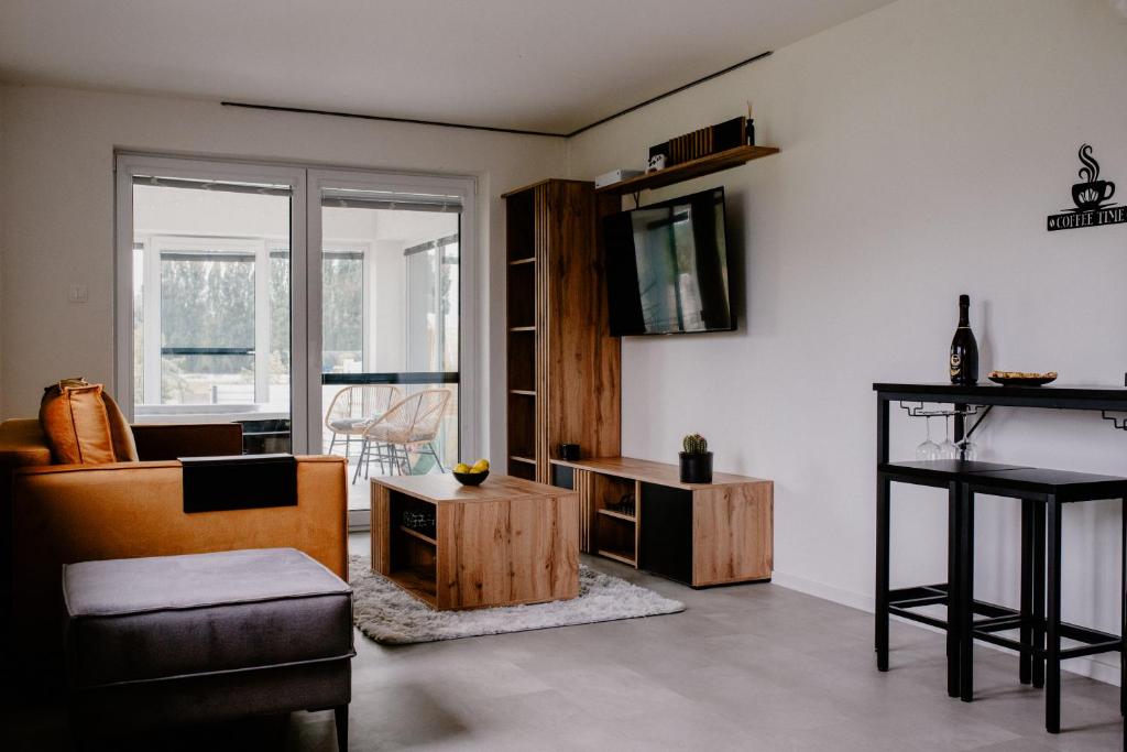 TV a/nebo společenská místnost v ubytování Apartment Fratello