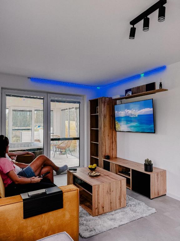 TV a/nebo společenská místnost v ubytování Apartment Fratello
