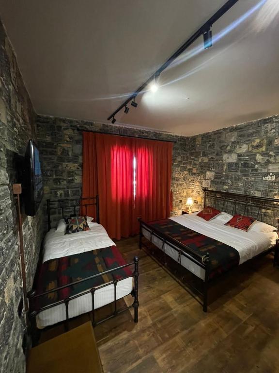 Postel nebo postele na pokoji v ubytování Helga's Guesthouse