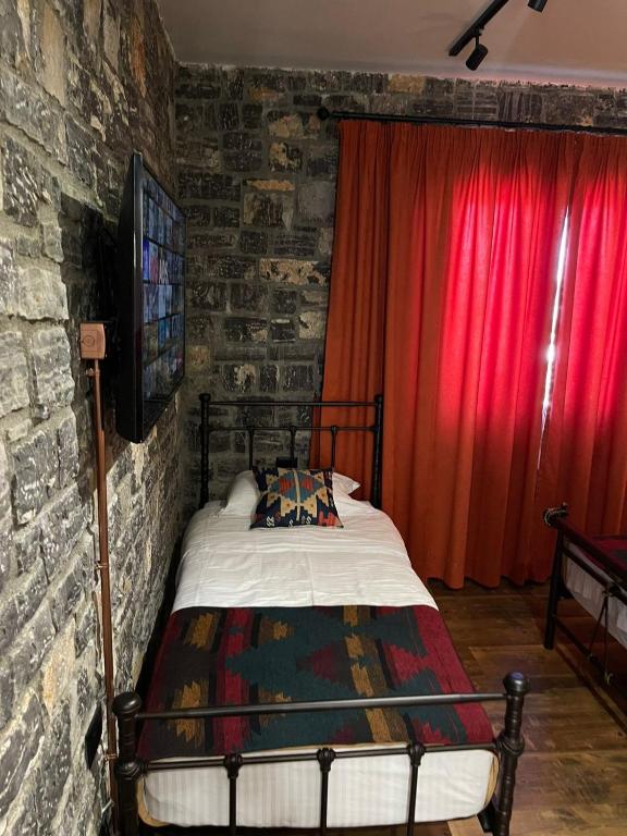Postel nebo postele na pokoji v ubytování Helga's Guesthouse