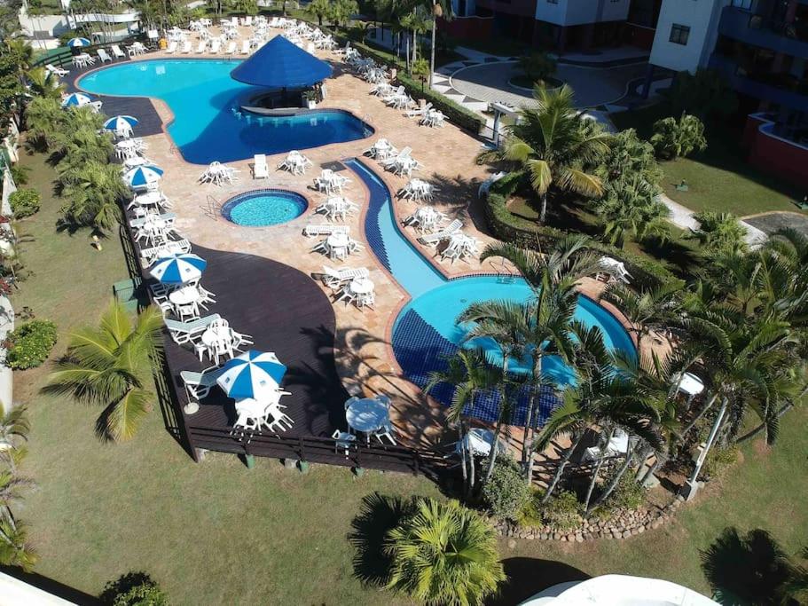 Bazén v ubytování Condomínio Resort Ilhas do Caribe nebo v jeho okolí