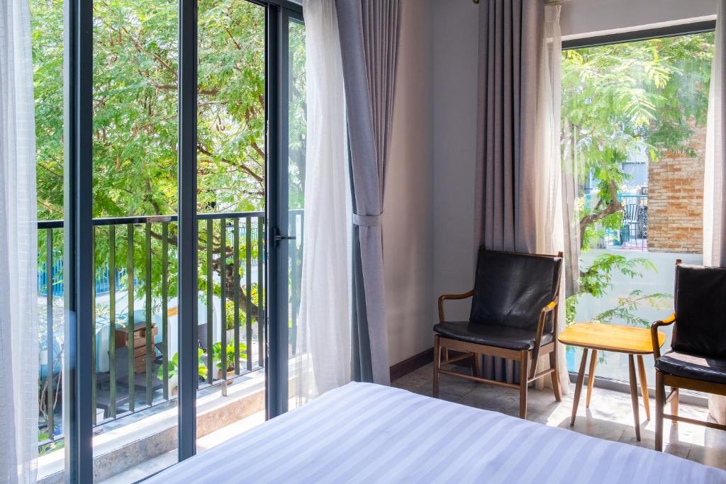 Phòng Deluxe 2 giường đơn với ban công