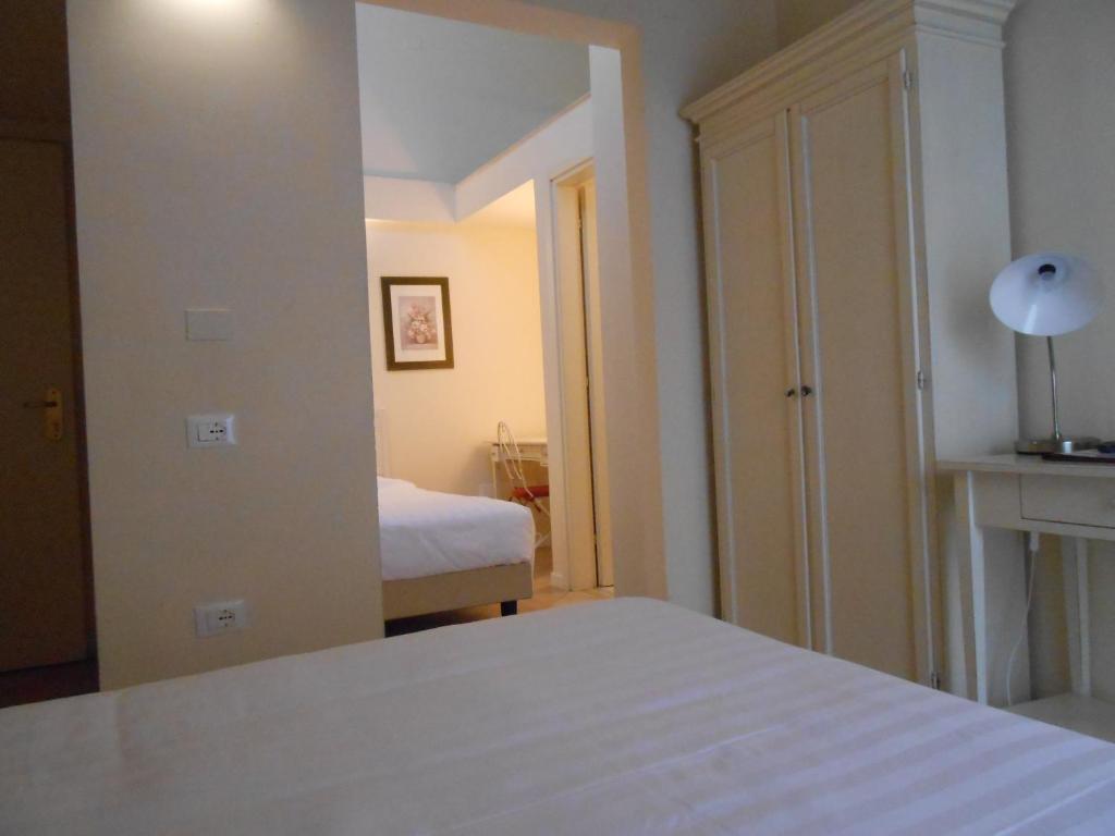 Łóżko lub łóżka w pokoju w obiekcie Hotel Atlantic