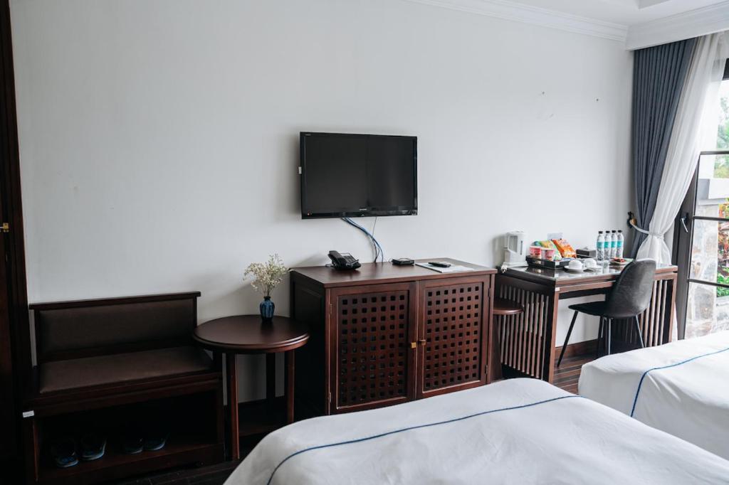Postel nebo postele na pokoji v ubytování Paradise Soc Son Resort