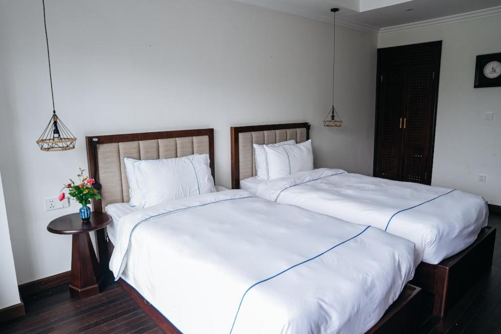 Postel nebo postele na pokoji v ubytování Paradise Soc Son Resort