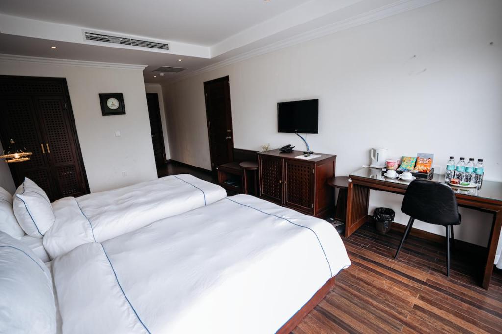 TV a/nebo společenská místnost v ubytování Paradise Soc Son Resort