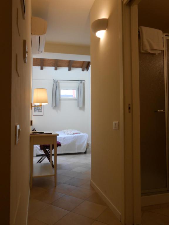 Łóżko lub łóżka w pokoju w obiekcie Hotel Atlantic